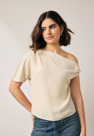 Next Nyomott mintás póló - cream