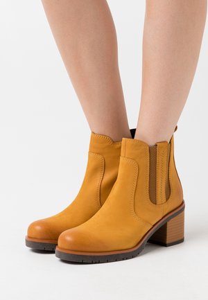 Marco Tozzi, Boots à talons - yellow