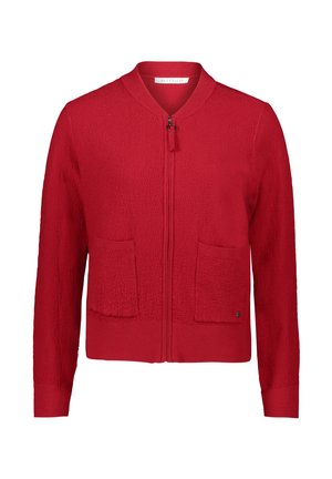 Gilet zippé rouge avec un tissage texturé. Doté de deux poches plaquées à l'avant et d'un col côtelé. Conçu avec des manches longues.