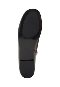 Brown leather shoe outsole with a textured black rubber bottom. Features a smooth edge and embossed brand logo. Rounded toe design.