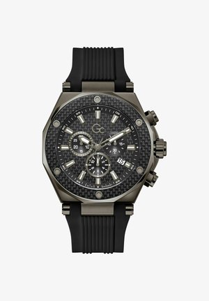 Črno gumijasto poslovno uro z osemkotno kovinsko ohišje, dial iz karbonskih vlaken, srebrni oznake za ure in tremi podmerami za funkcije kronografa.