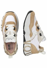 Sneakers with a white mesh upper, tan suede accents, black laces, and a patterned outsole. Features a cushioned insole and pull tab.