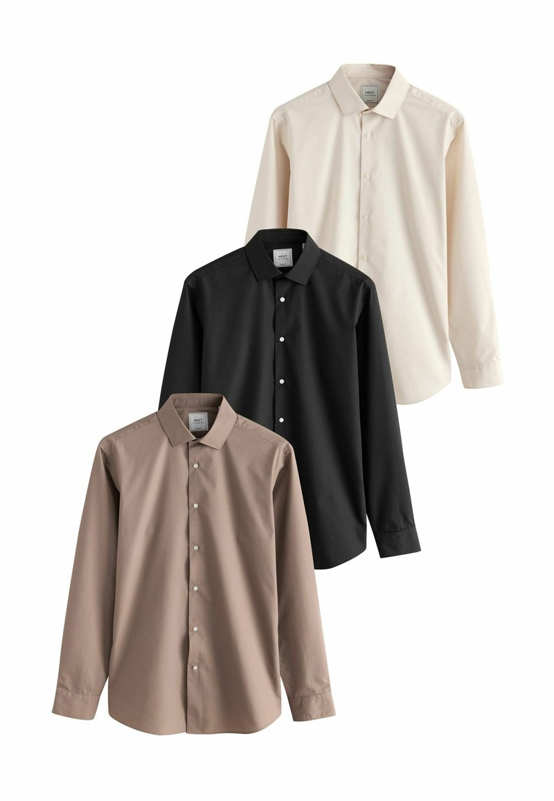 Trois chemises à manches longues avec boutons dans les couleurs : noir profond, beige clair et taupe. Fabriquées en tissu lisse avec des cols standards et des boutons blancs.