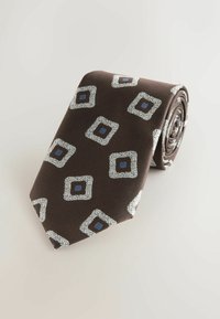 Brown tie with a diagonal ribbed texture, featuring a geometric pattern of white squares with blue accents. Rolled for presentation.