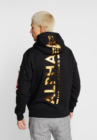 Alpha Industries - BACK PRINT  - Hoodie - black/gold Miniatuurafbeelding 1