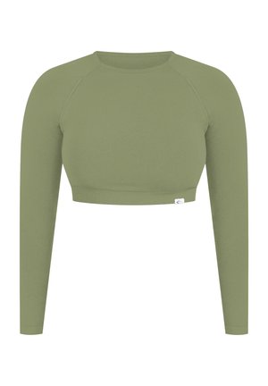 Langsleeve cropped top in olijfgroen, gemaakt van zachte katoen. Heeft raglanmouwen en een aangesloten ontwerp met een klein logo op de zoom.