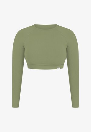 Langärmliger Cropped-Top in olivgrün, aus weicher Baumwolle. Verfügt über Raglanärmel und ein figurbetontes Design mit einem kleinen Logo am Saum.