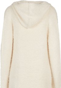 Hoodie en tricot duveteux couleur crème avec manches longues, tissu doux texturé, vu de dos.