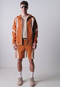 Oakley LATITUDE HOODIE - Jakna iz flisa - ginger