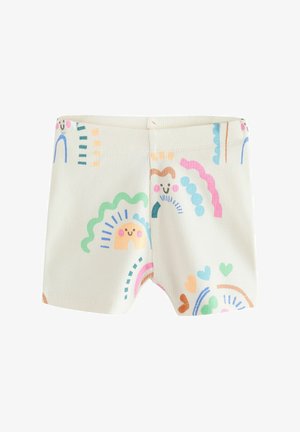 Gaiši krēmbaltas šorti ar ribotu faktūru, ar krāsainiem rakstiem, kuros attēloti varavīksnes un smaidīgas sejas rozā, zaļā, zilā un oranžā krāsā.