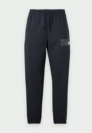 New Balance, REIMAGINED GRAPHIC JOGGER - Pantalon de survêtement - dark night