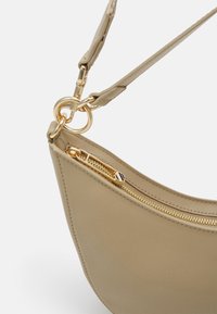 Tommy Hilfiger MONOTYPE SHOULDER BAG - Borsa a mano - beige