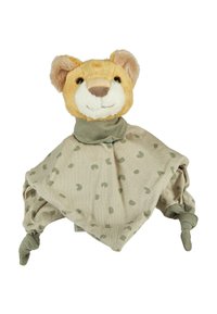 Soft plush lion head in light orange with a smiling face, attached to a beige cotton cloth with green polka dots and knotted corners.