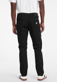 Guess Jeans SLIM  - Slimfit džínsy - schwarz
