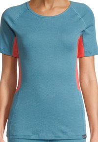 Top atletico a maniche corte in teal con pannelli in rete corallo ai lati. Presenta un collo rotondo e una texture liscia.