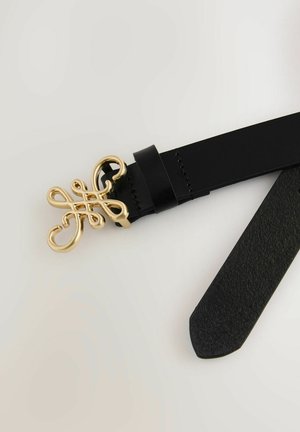 Mustast nahast vöö, millel on kuldse tooniga peen rulluvate mustritega pandla. Vööl on sile tekstuur ja terav ots.
