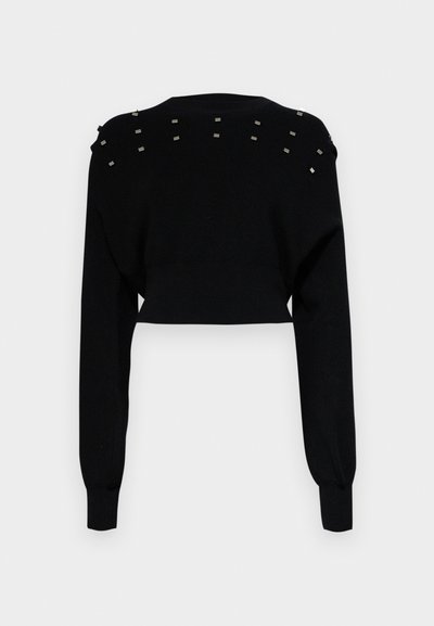 Svart crop-sweater med långa ärmar, med ett strukturerat stickat mönster och metalliska nitar på axlarna. Slät tyg.