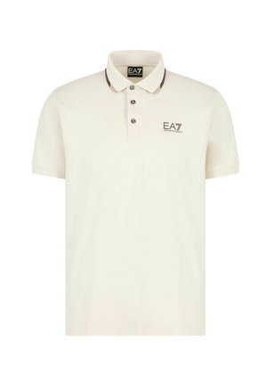 Polo a maniche corte in crema con rifiniture del collo marrone scuro, patta con tre bottoni e logo EA7 sul petto sinistro. Tessuto in morbido misto cotone.