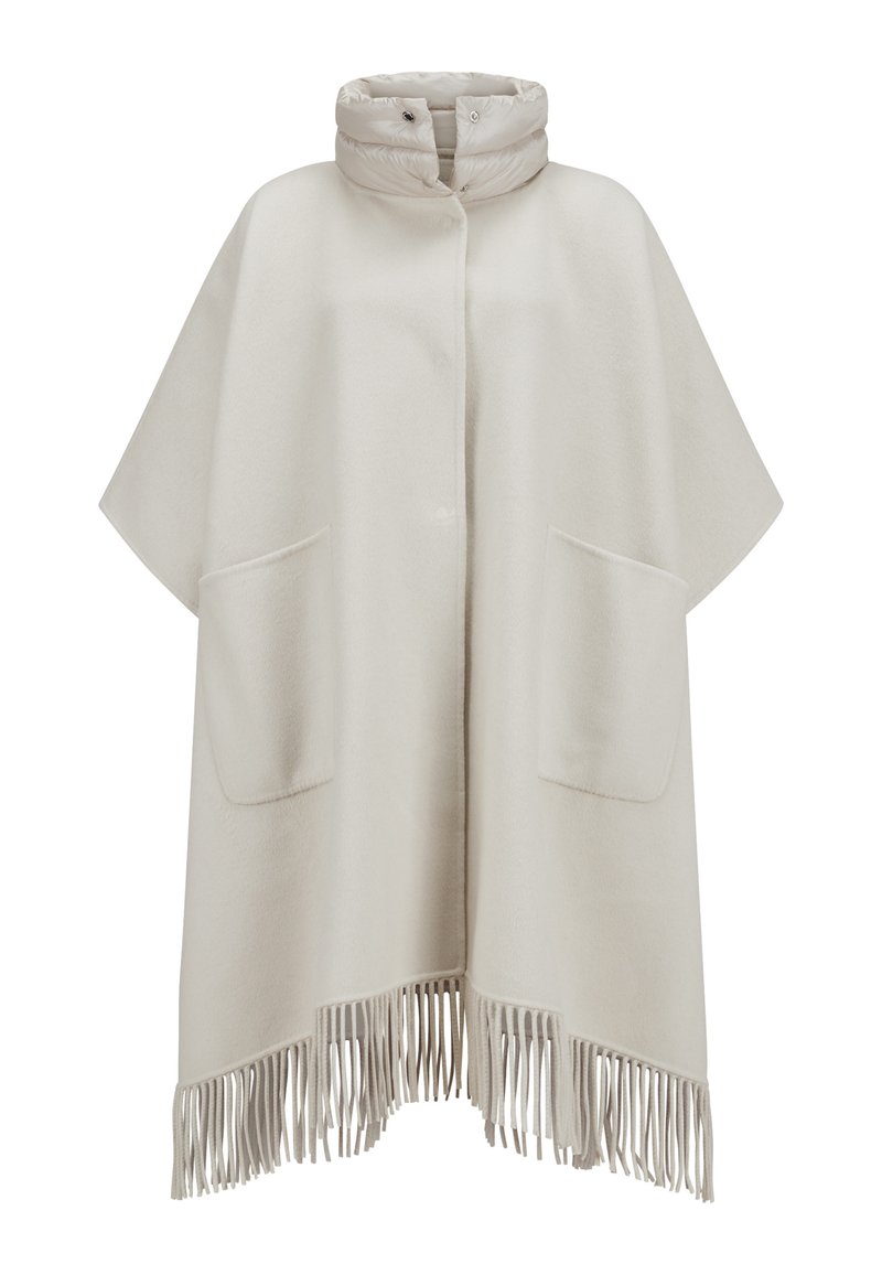 Helles beiges Poncho mit hohem Kragen und Druckknopfverschluss. Verfügt über zwei Vordertaschen und einen fransigen Saum. Weicher Stoff und lockere Passform.