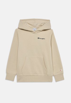 Beige Champion hoodie med front kængurulomme, hætte, ribmanchetter og broderet "Champion" logo på brystet og ærmet.