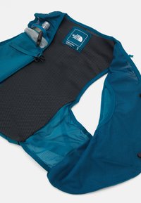 The North Face SUNRISER RUN VEST UNISEX - Víztartályos hátizsák - blue moss/sapphire slate