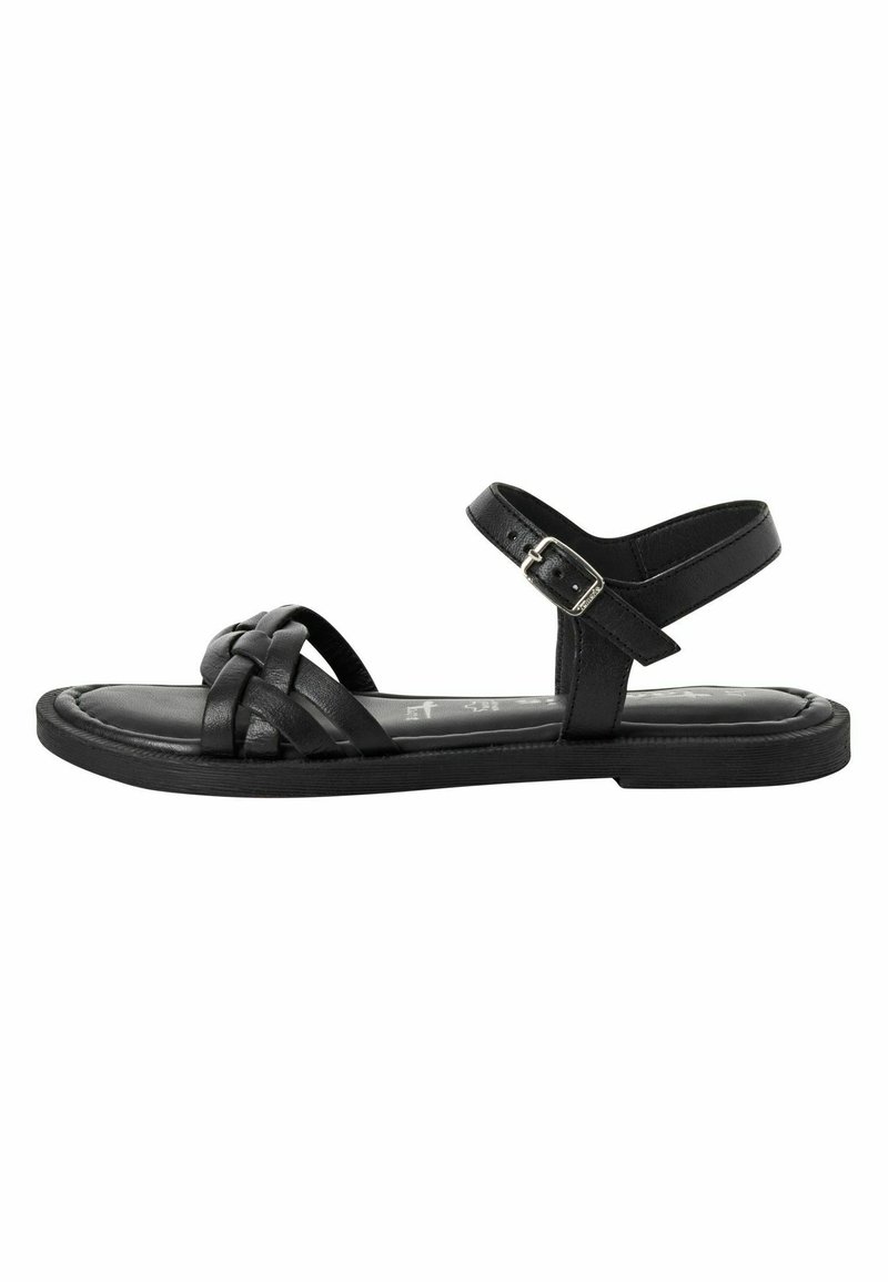 Sandale en cuir noir avec un design supérieur tressé, sangle de cheville réglable, semelle plate et texture lisse. Convient pour un usage décontracté.