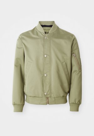 Light green bomber jacket with ribbed collar, cuffs, and hem, front snap buttons, side pockets, and a zip pocket on the left sleeve.
