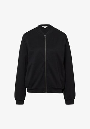 Giacca bomber nera con zip, polsini, colletto e orlo a costine, esposta su uno sfondo bianco.
