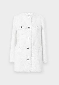 White tweed jacket with a textured fabric, featuring two front pockets, a high collar, and silver buttons for closure and accents.