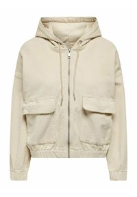 Beżowa kurtka z kapturem wykonana z sztruksu, z przodem na zamek błyskawiczny, dwiema kieszeniami na piersi, elastycznymi mankietami oraz teksturowanym wykończeniem.