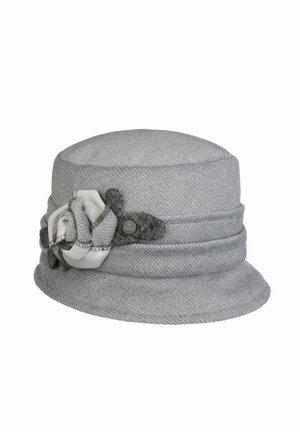 Light gray textured cloche hat with a folded fabric flower and dark gray leaf accents on the side.