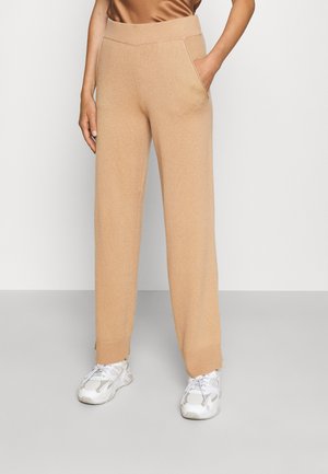 TROUSERS - Tracksuit bottoms - almond
