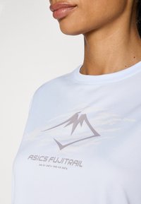 ASICS FUJITRAIL LOGO TOP - Top dugih rukava - blue fade