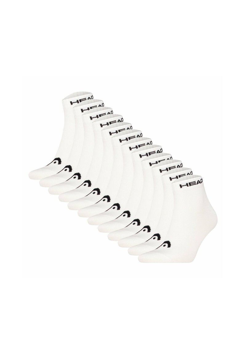 Chaussettes blanches de cheville avec une bande de logo noire et des accents graphiques courbés. Vendues par pack de dix, fabriquées en matériau doux et extensible.