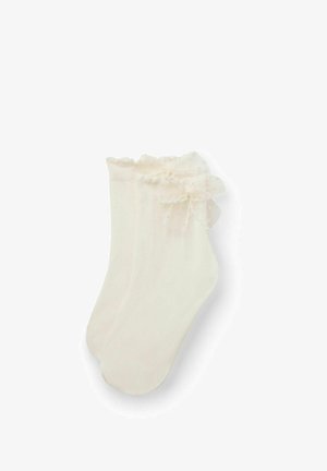 Calcetines tobilleros color crema con borde de encaje fruncido y un pequeño lazo decorativo en cada puño, mostrados sobre un fondo blanco.