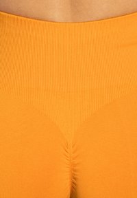 Smilodox EDINA SEAMLESS SCRUNCH - Tights - orange