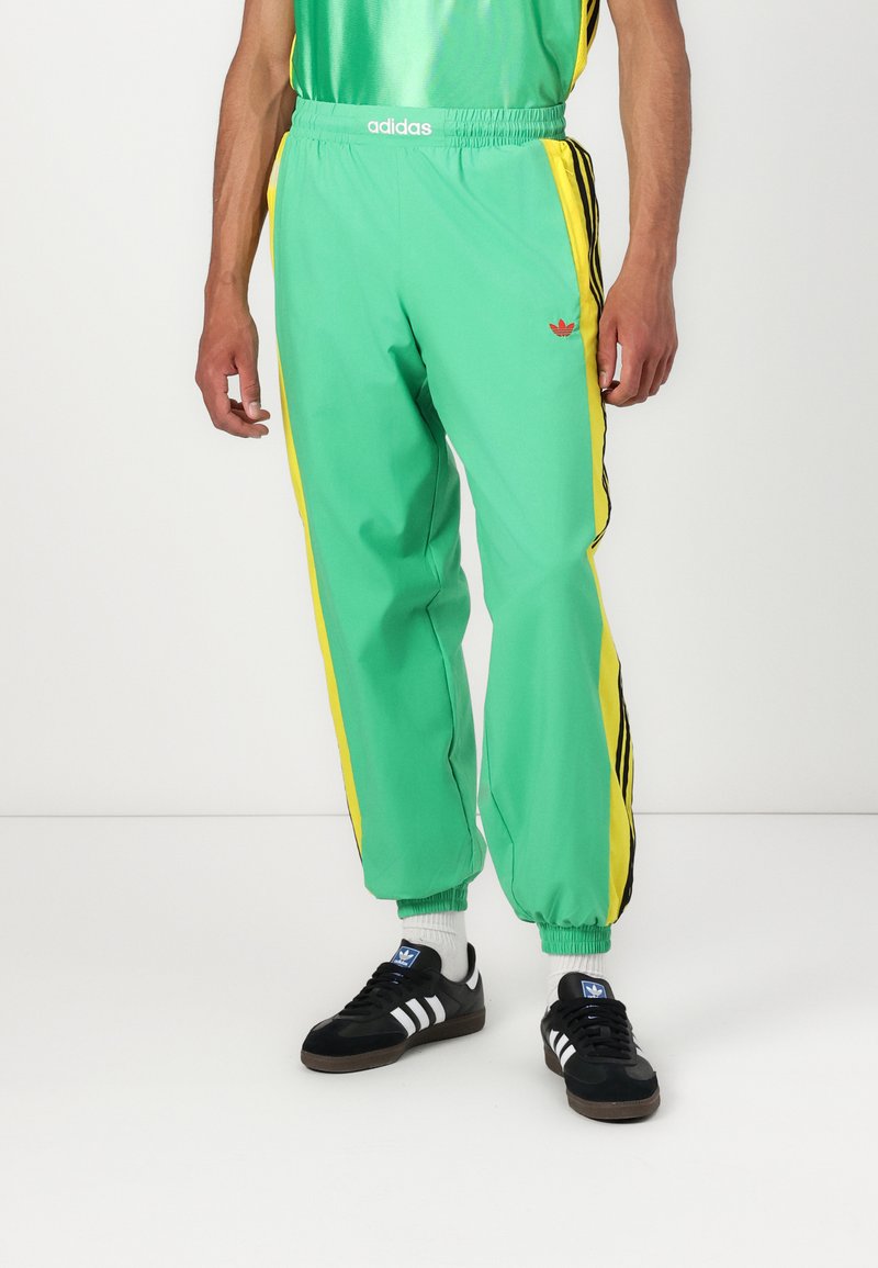 adidas Originals - WARM UP  - Tracksuit bottoms - energy green, Enlarge