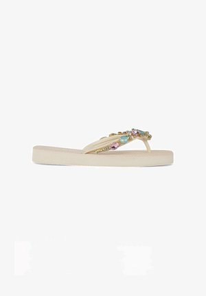 Beige flip-flopsandalen met een gestructureerde zool, met decoratieve juwelen in pasteltinten en gouden accenten op de band.