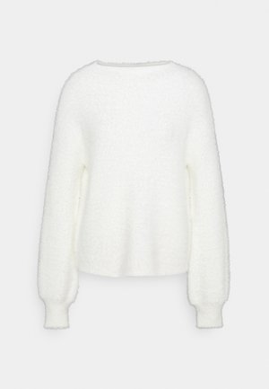 Pull blanc à manches longues en tissu duveteux avec un col rond et des poignets côtelés, présenté sur un fond gris clair uni.