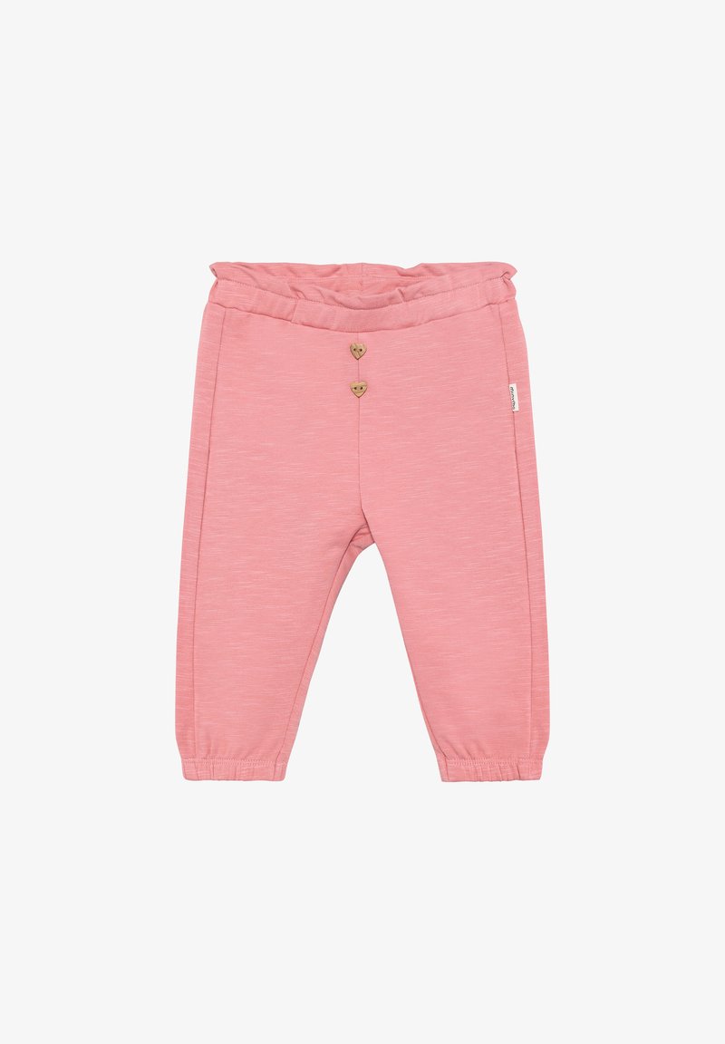 Pantalon en coton rose pâle avec une taille élastique, deux boutons décoratifs en forme de cœur en bois, et des chevilles resserrées. Texture lisse.