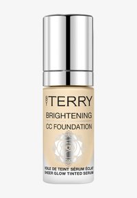 Luftlose Pumpflasche mit CC-Foundation; klarer Glasboden, goldene Flüssigkeit, silberner Deckel, florales Design auf dem Etikett, 30ml Fassungsvermögen.