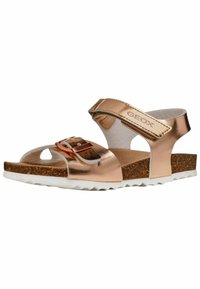 Roze-gouden metallic sandalen met een kurken voetbed, verstelbare band met gesp-detail en een witte rubberen zool met een zigzagpatroon.