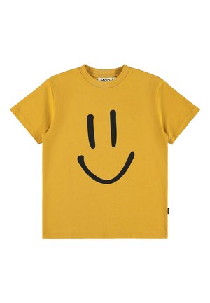 Camiseta amarilla de manga corta con una gran cara sonriente negra en el frente y un cuello redondo.