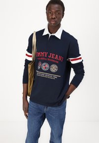 Tommy Jeans ISAAC - Relaxed fit jeans - denim dark