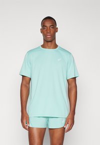 ASICS CORE TOP - Camiseta deportiva - green