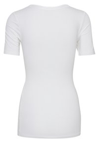 T-shirt blanc ajusté à manches courtes montré de dos avec un col rond et une texture de tissu lisse.