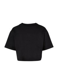 Juoda surišta t-shirt, pagaminta iš medvilnės, su apvalia iškirpte ir trumpomis rankovėmis, laisvu siluetu. Lygus paviršius, be raštų ar dekoracijų.