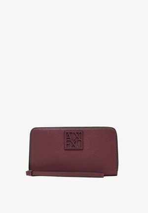 Portafoglio a polso rettangolare in pelle bordeaux con logo Armani Exchange in rilievo e cinturino sottile attaché.