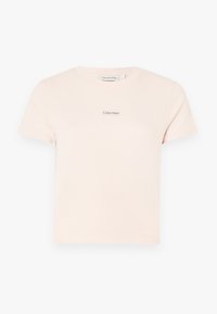 Šviesiai rožinė medvilninė marškinėliai trumpomis rankovėmis ir apvali iškirpte. Papuošta mažai Calvin Klein logotipu krūtinės srityje.