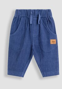 Pantalones de pana azules para niño pequeño con cintura elástica, cordón, bolsillos laterales y parche de marca cosido en la pierna derecha.